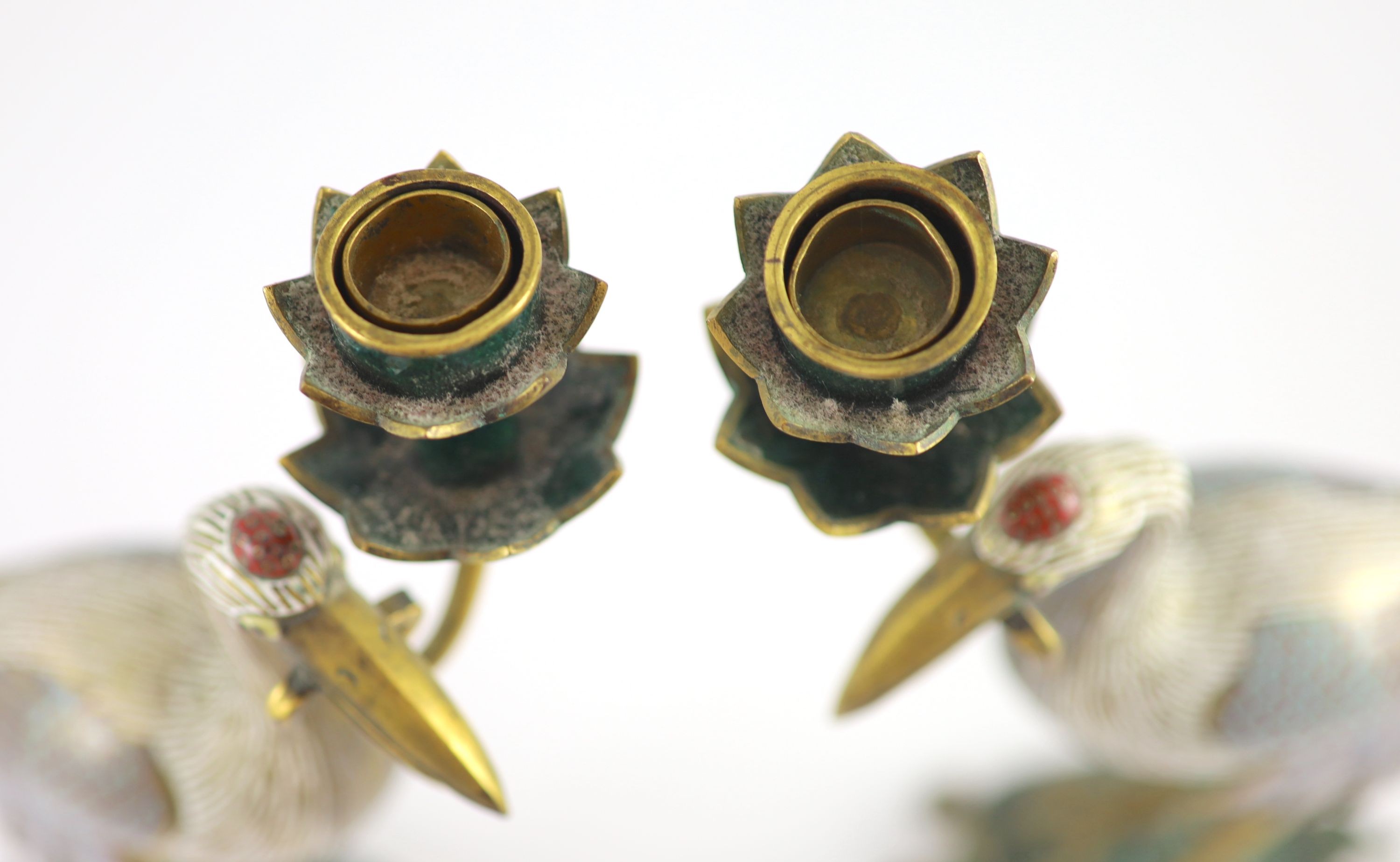 A pair of Chinese cloisonné enamel and gilt bronze ’crane’ candlesticks, early 20th century, 38cm high